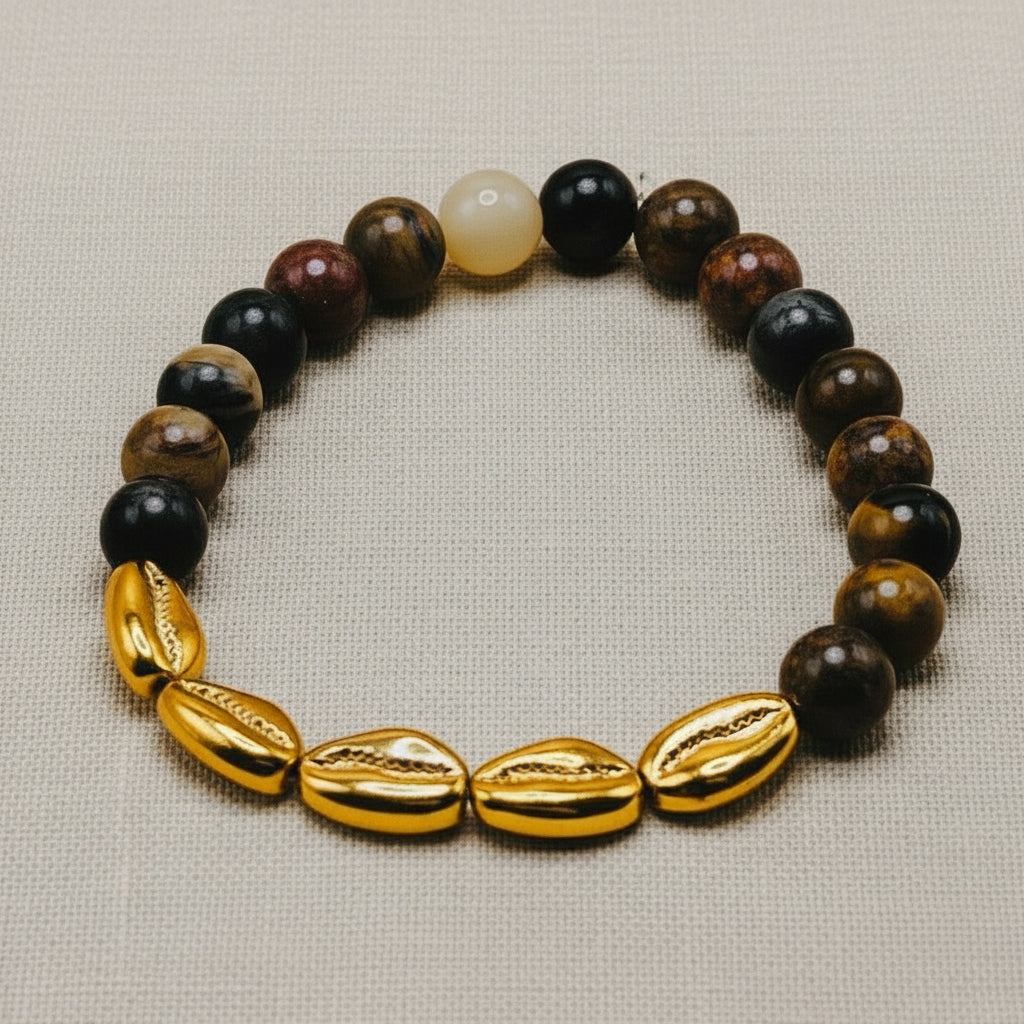 A multicolored beaded bracelet with a mix of brown, black, and gold beads, featuring elastic design for comfort.